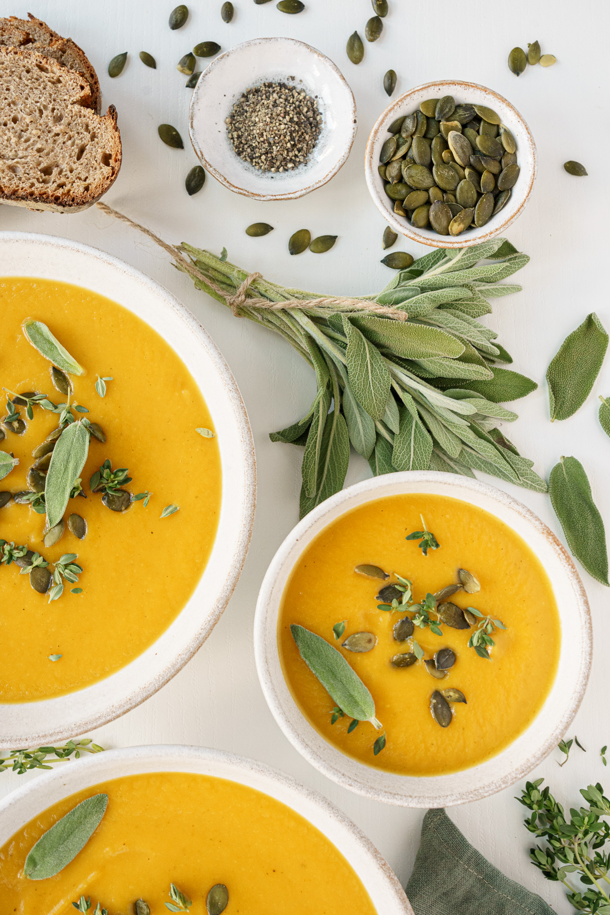 Top view of plates filled with vegan butternut squash soup