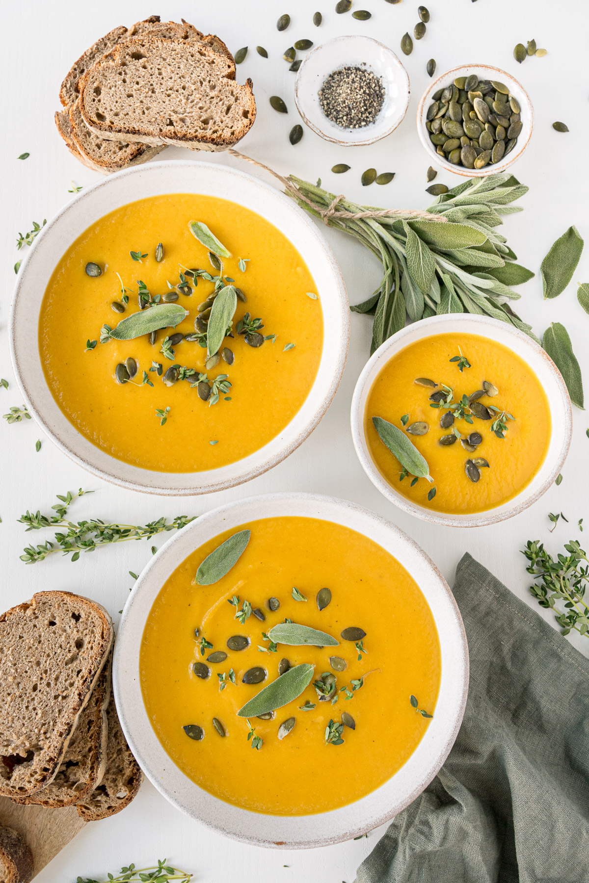 Top view of bowls filled with butternut squash soup