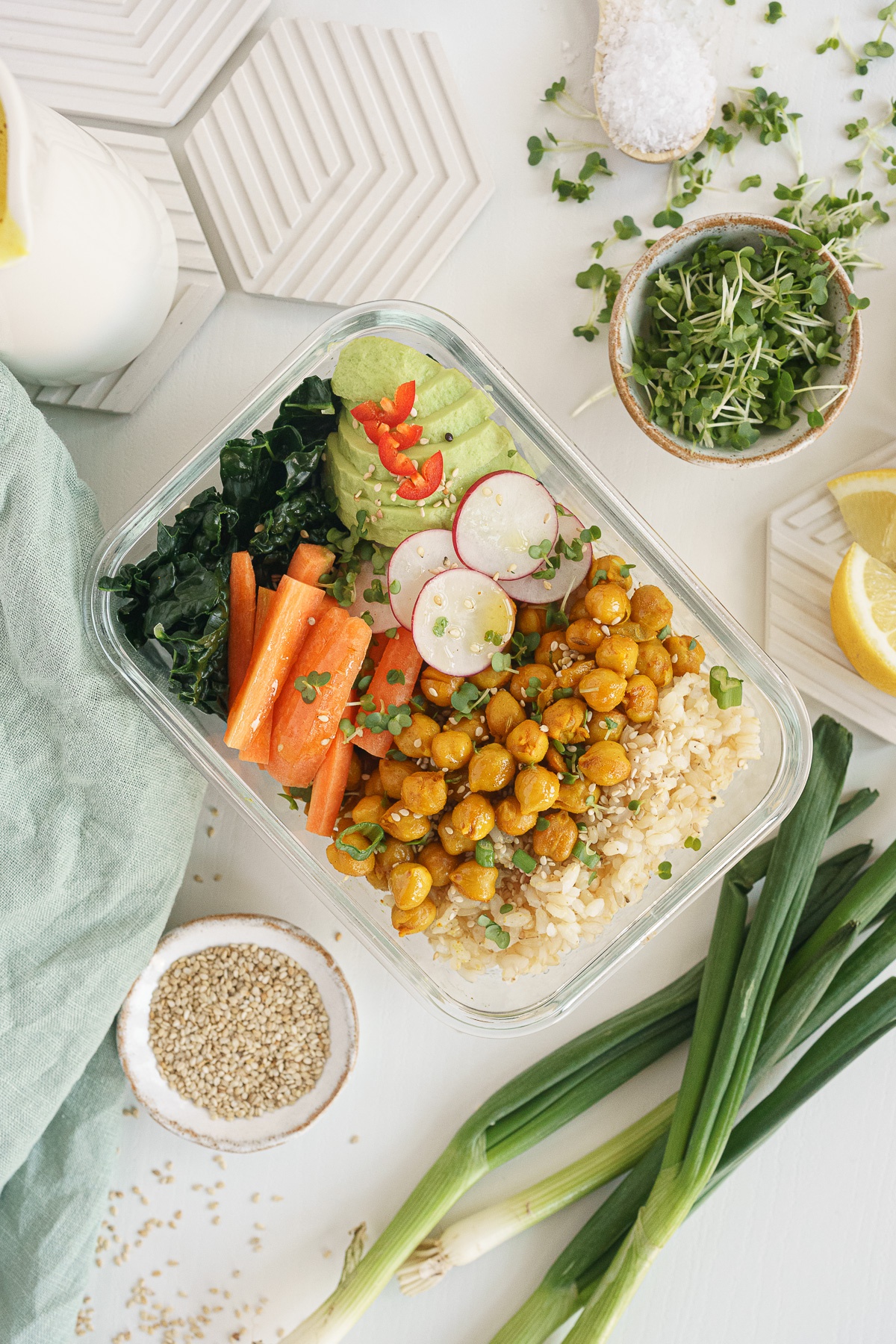 Chickpea Buddha bowl in a glass meal prep container.