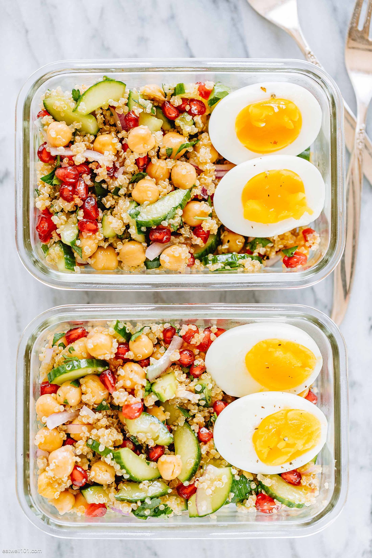 Chickpea salad with eggs in meal prep containers.