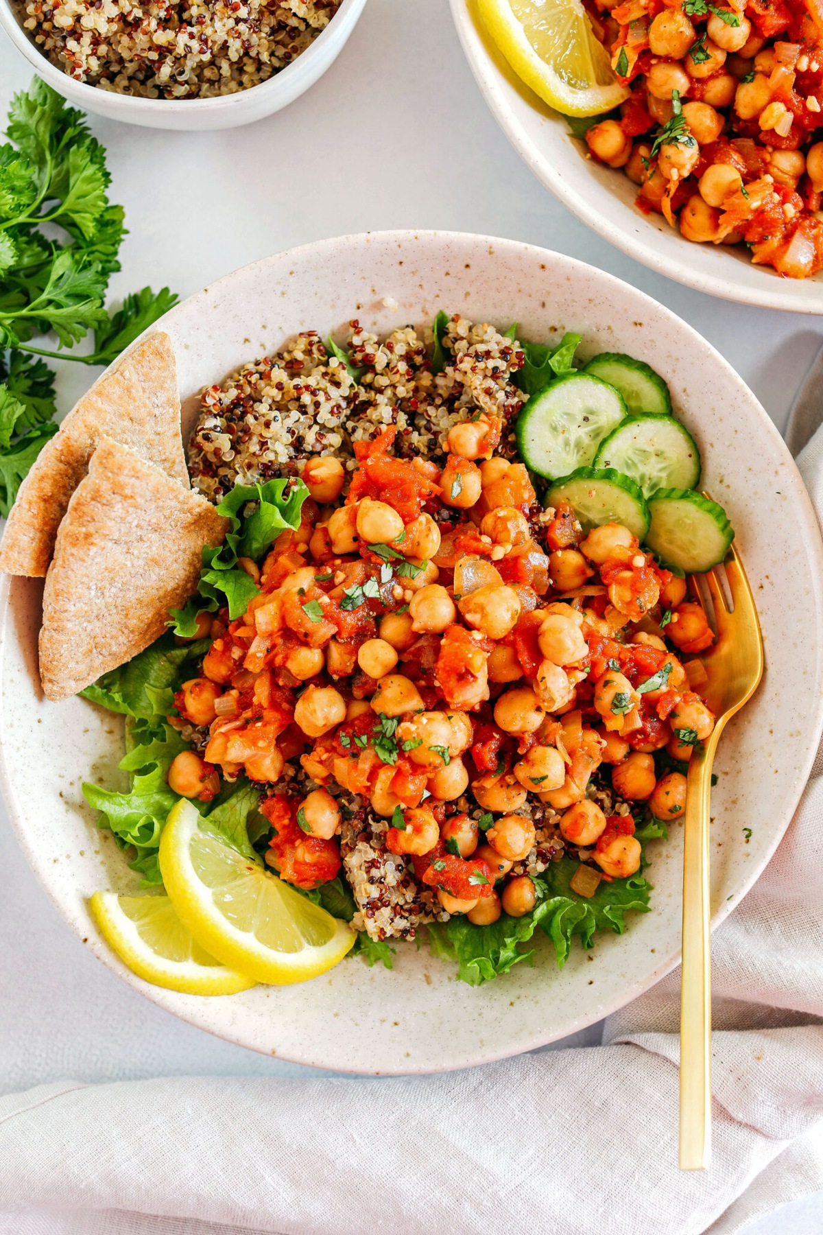 Spicy chickpea quinoa bowls with lots of veggies.