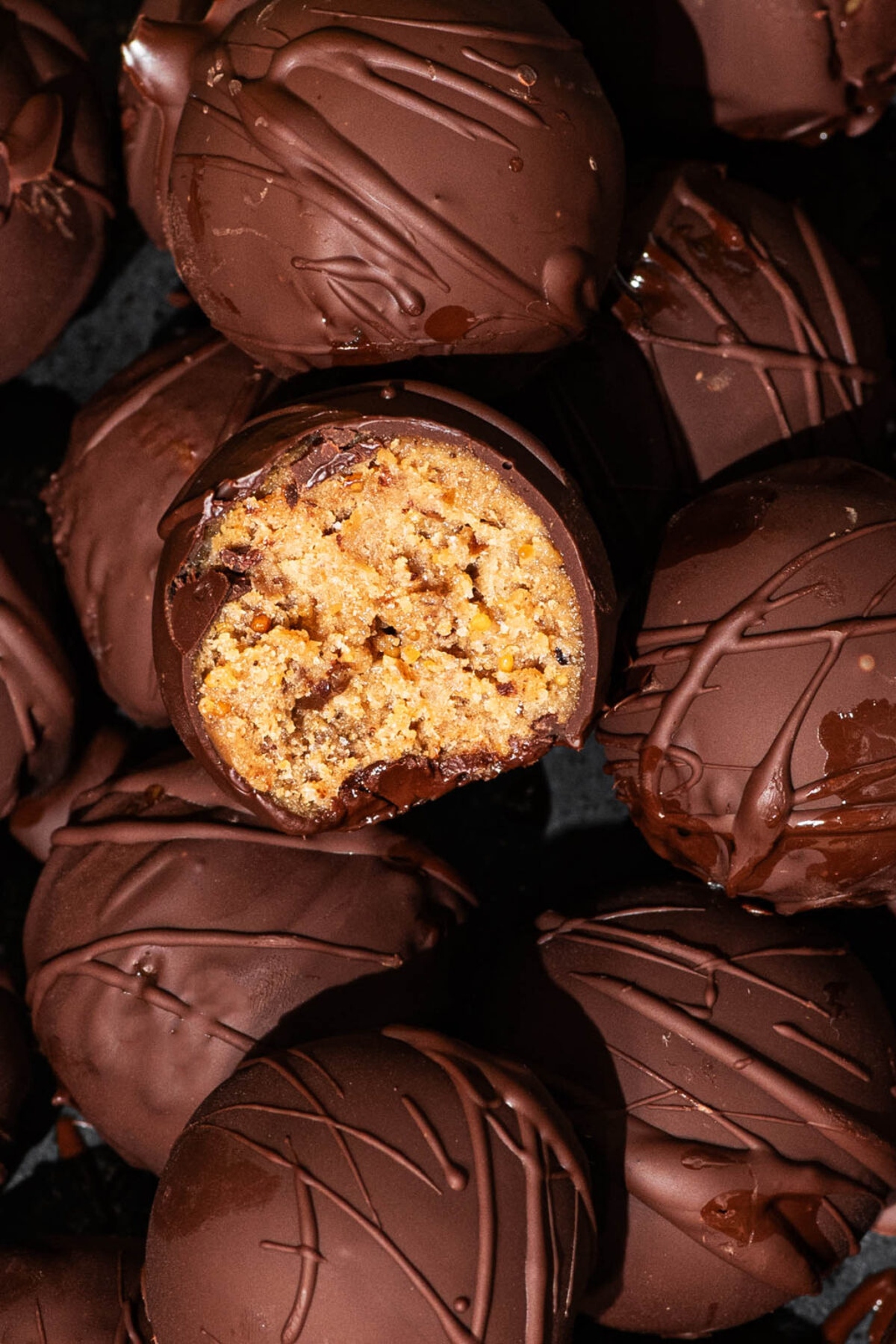 Peanut butter balls laid on a tray.