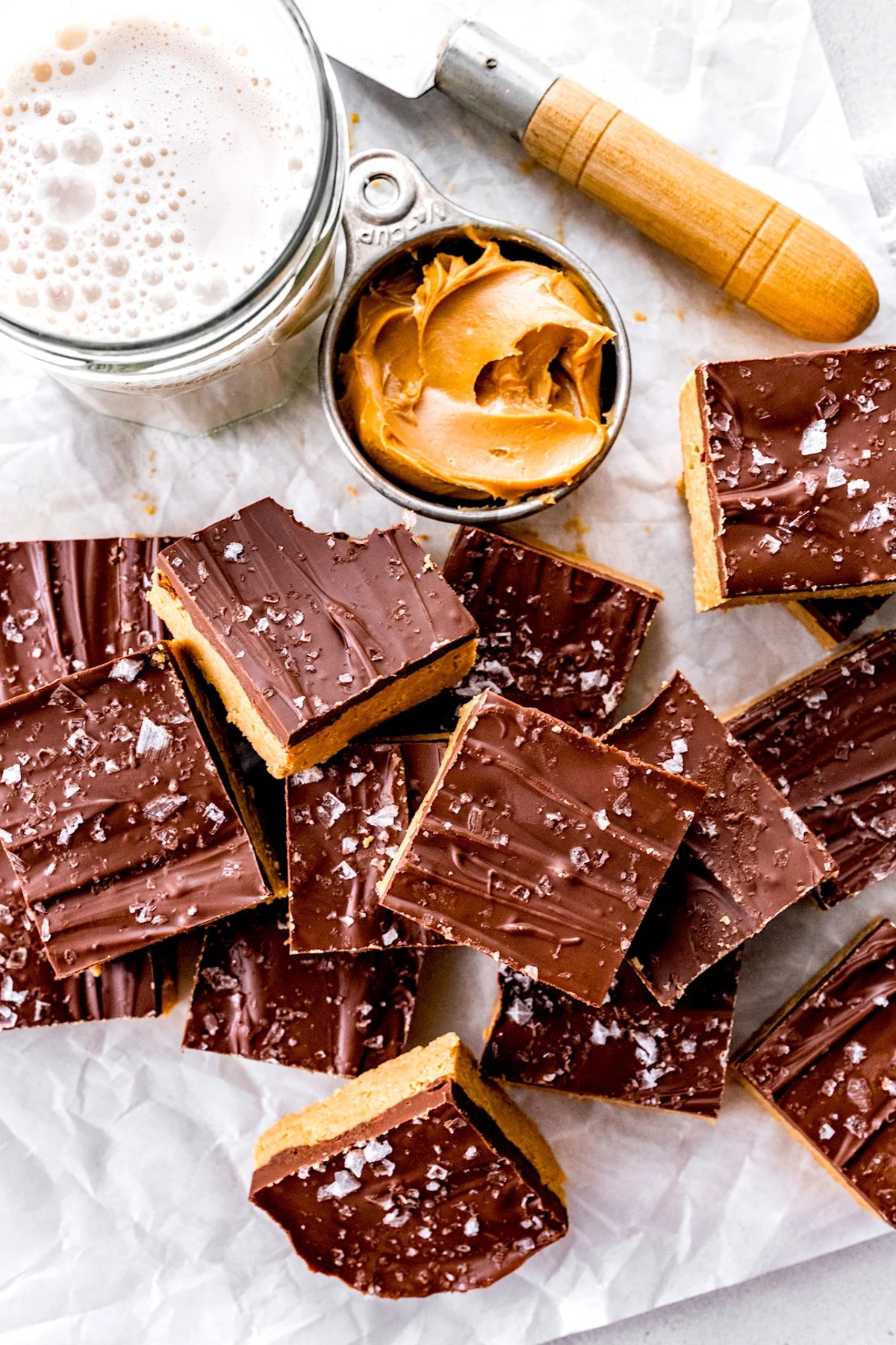 No bake peanut butter bars laid on a table.