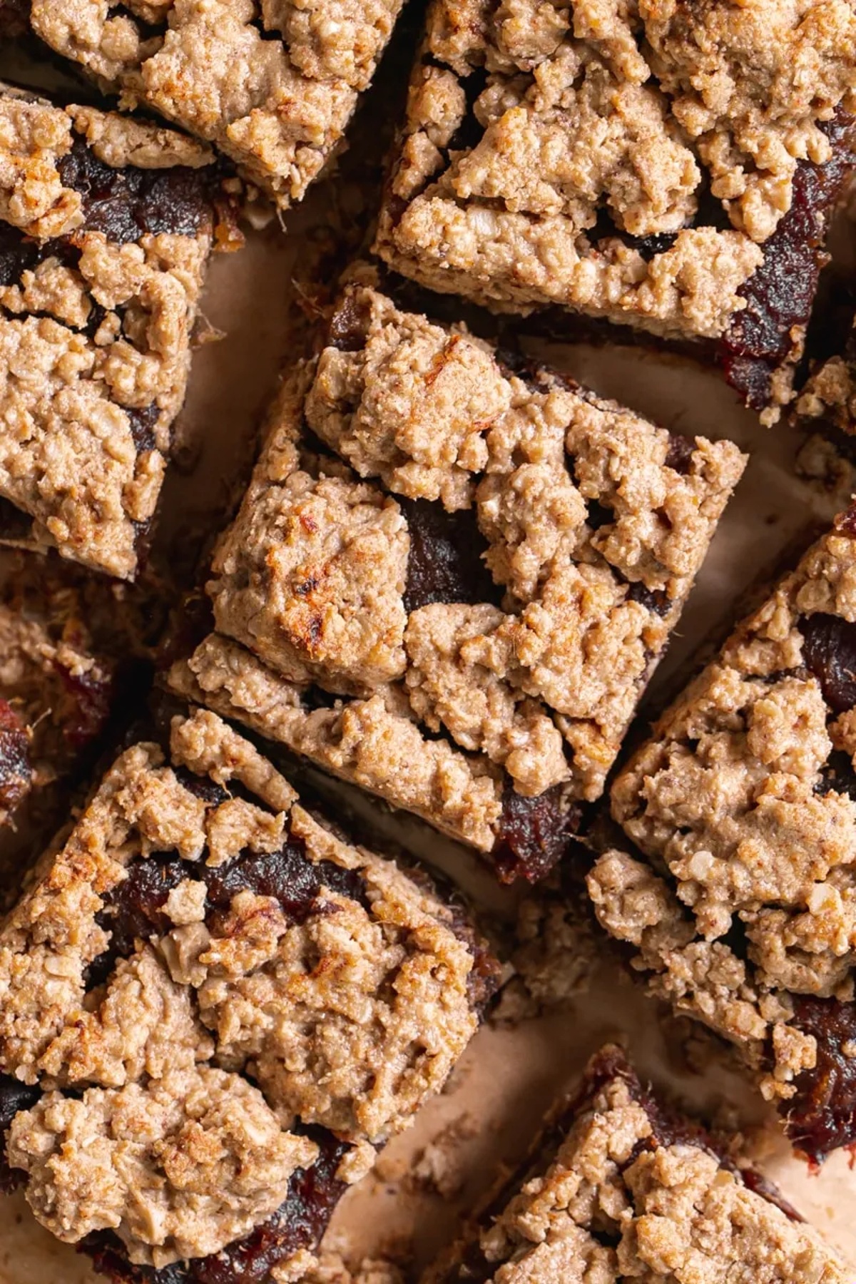 Peanut butter oat date crumb bars laid on a tray.