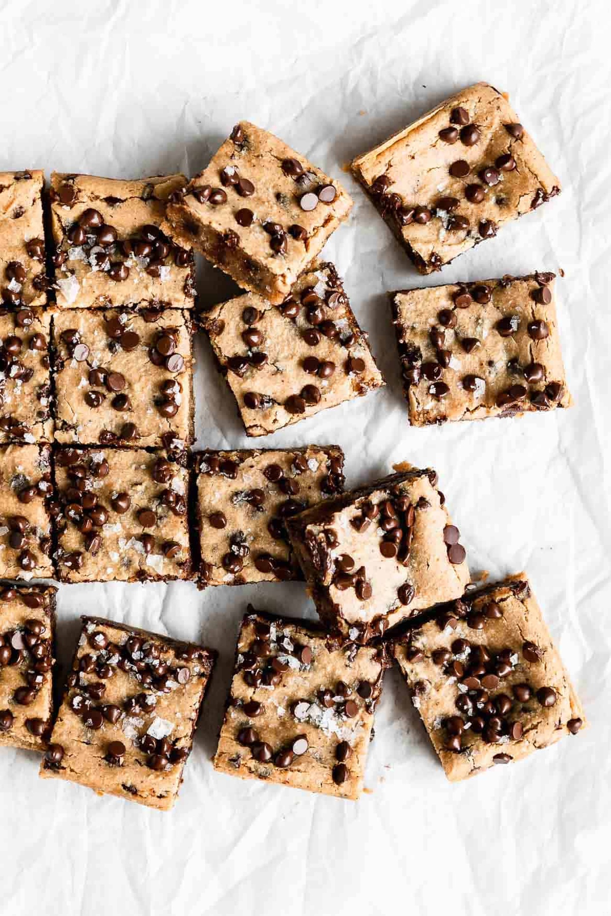 Peanut butter chickpea blondies laid on a baking sheet.