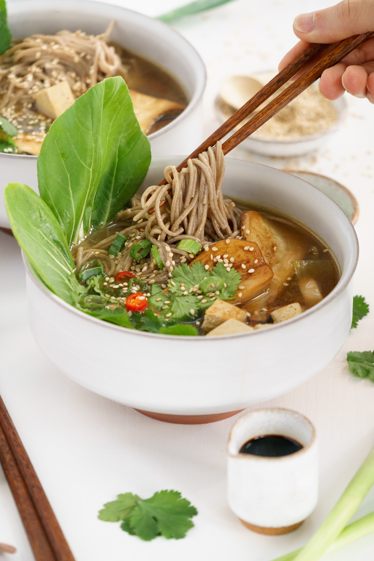 A bowl of vegan ramen with tofu.