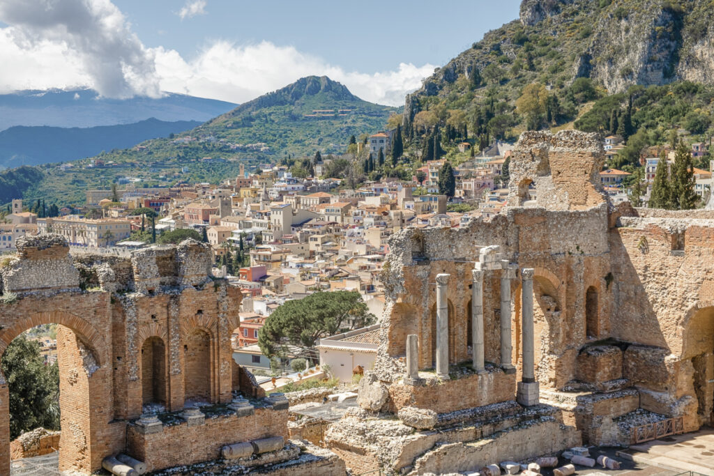 Greek Theatre in Taormina with Mount Etna in the background.