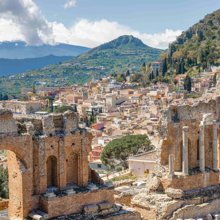 Greek Theatre in Taormina with Mount Etna in the background.