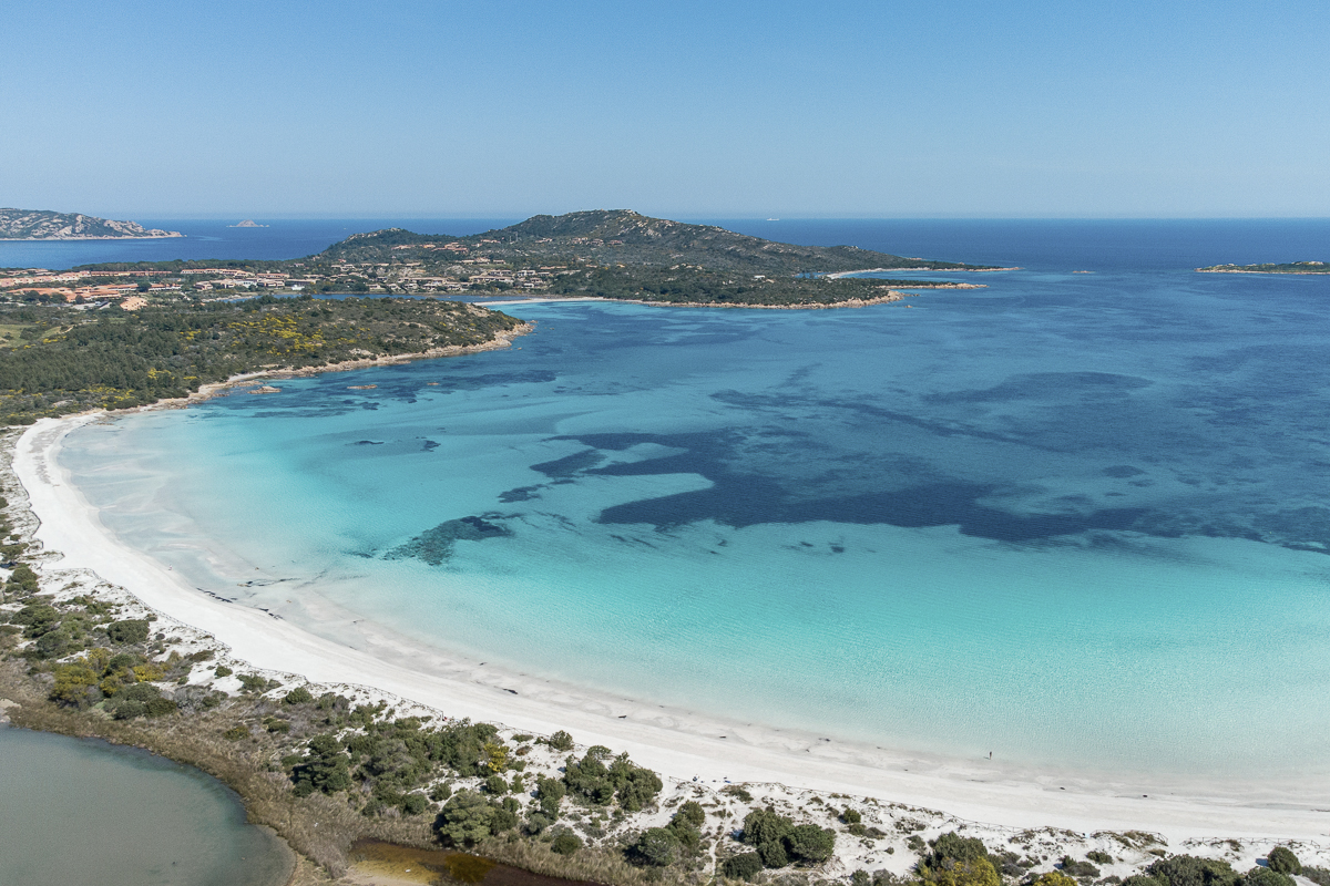 Aerial view of crystal clear water in Cala Brandinchi, Costa Smeralda.