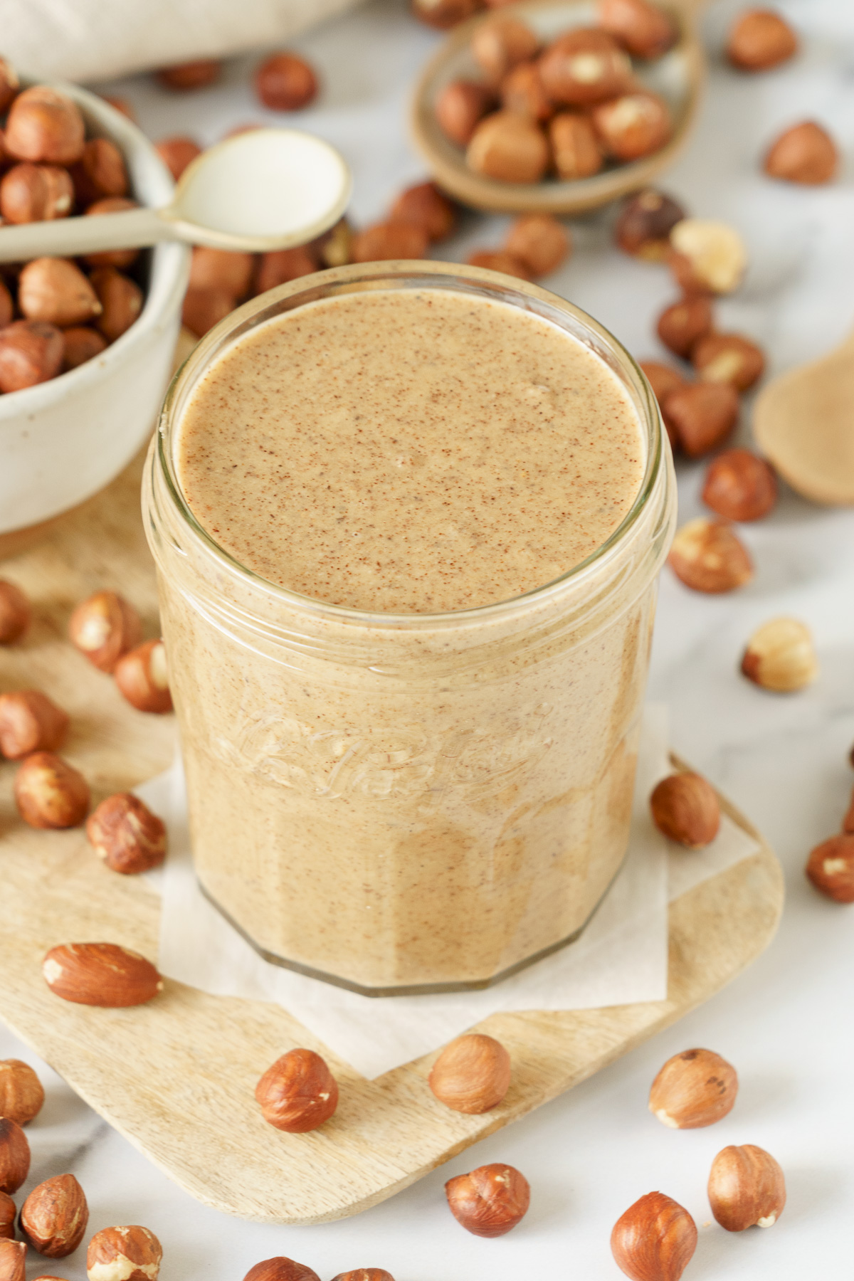 A jar of homemade hazelnut butter on the table.