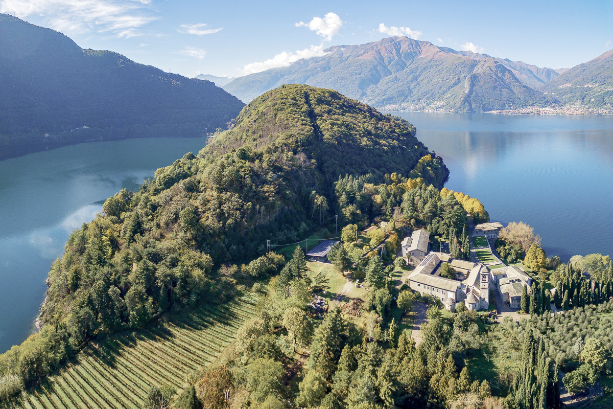 Aerial view of Piona Abbery with Lake Como in the background.