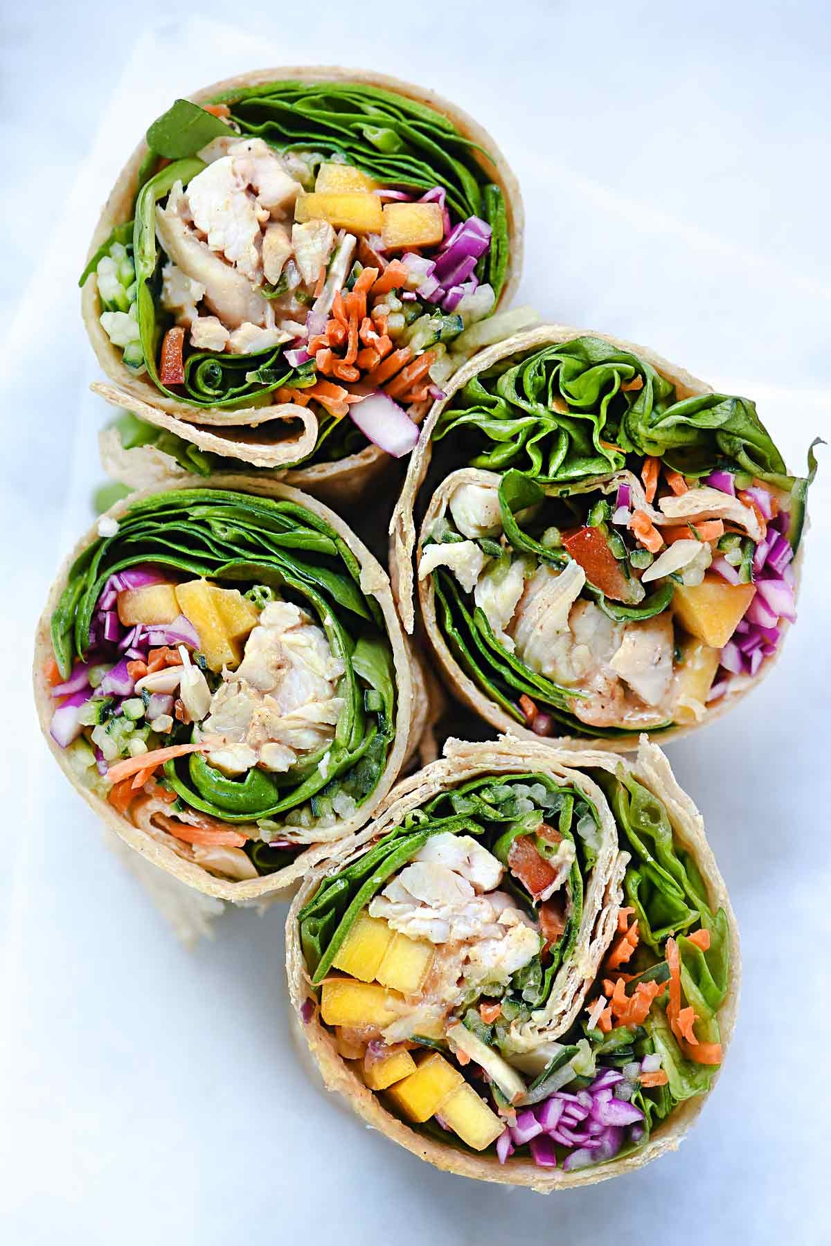 Chicken mango rainbow veggie wraps.