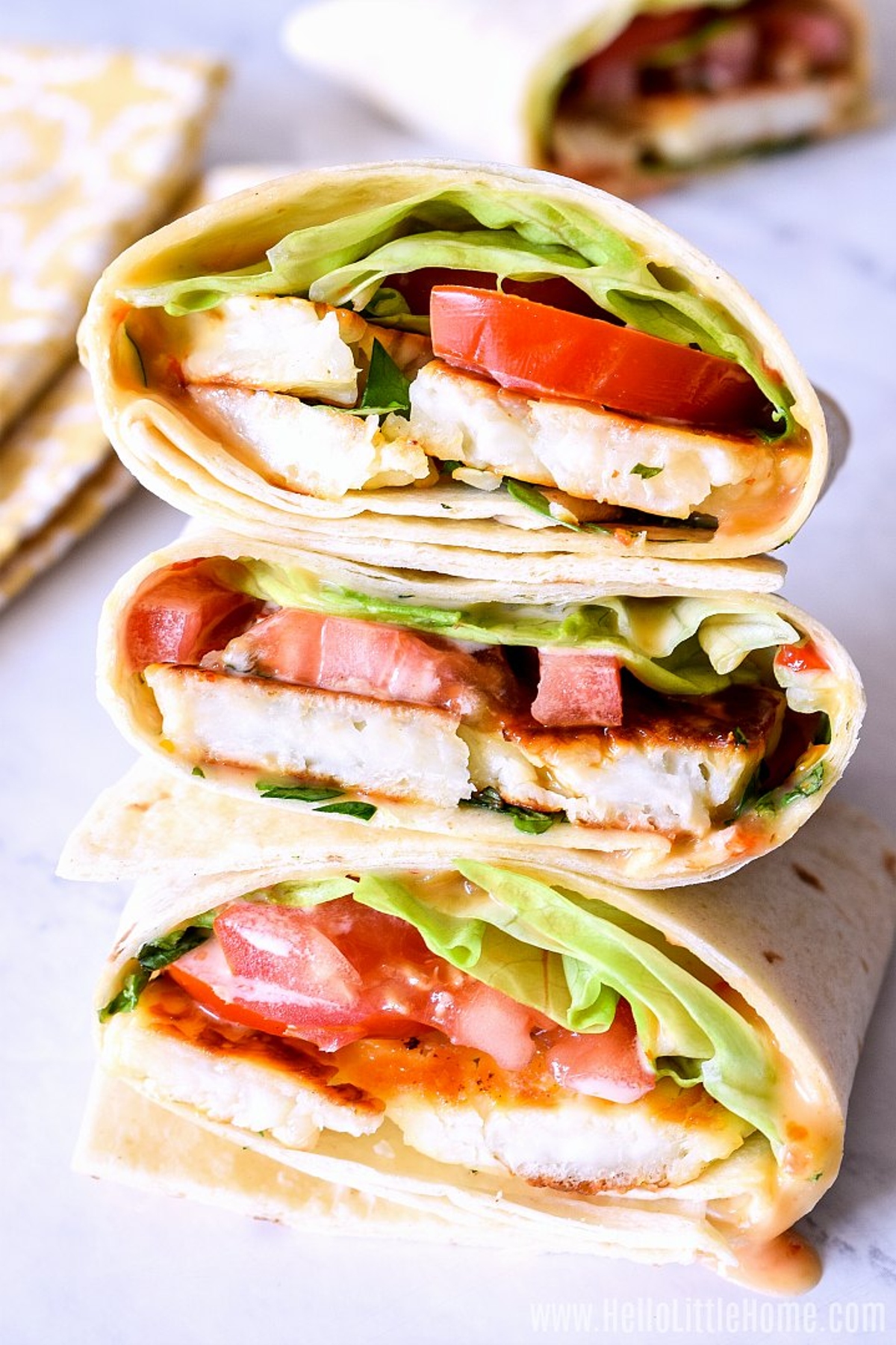 A pile of halloumi wraps.