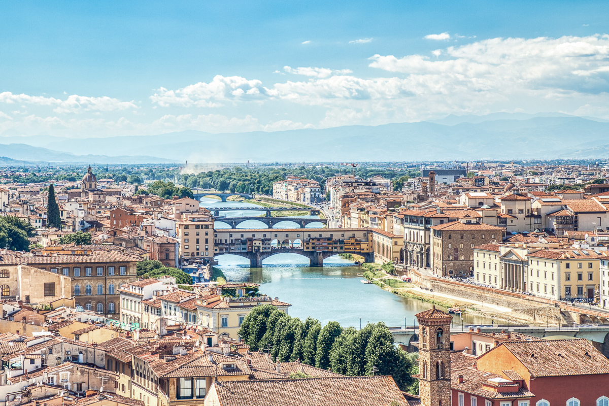 Florence Aerial View of Ponte Vecchio Bridge during Beautiful Sunny Day, Italy.