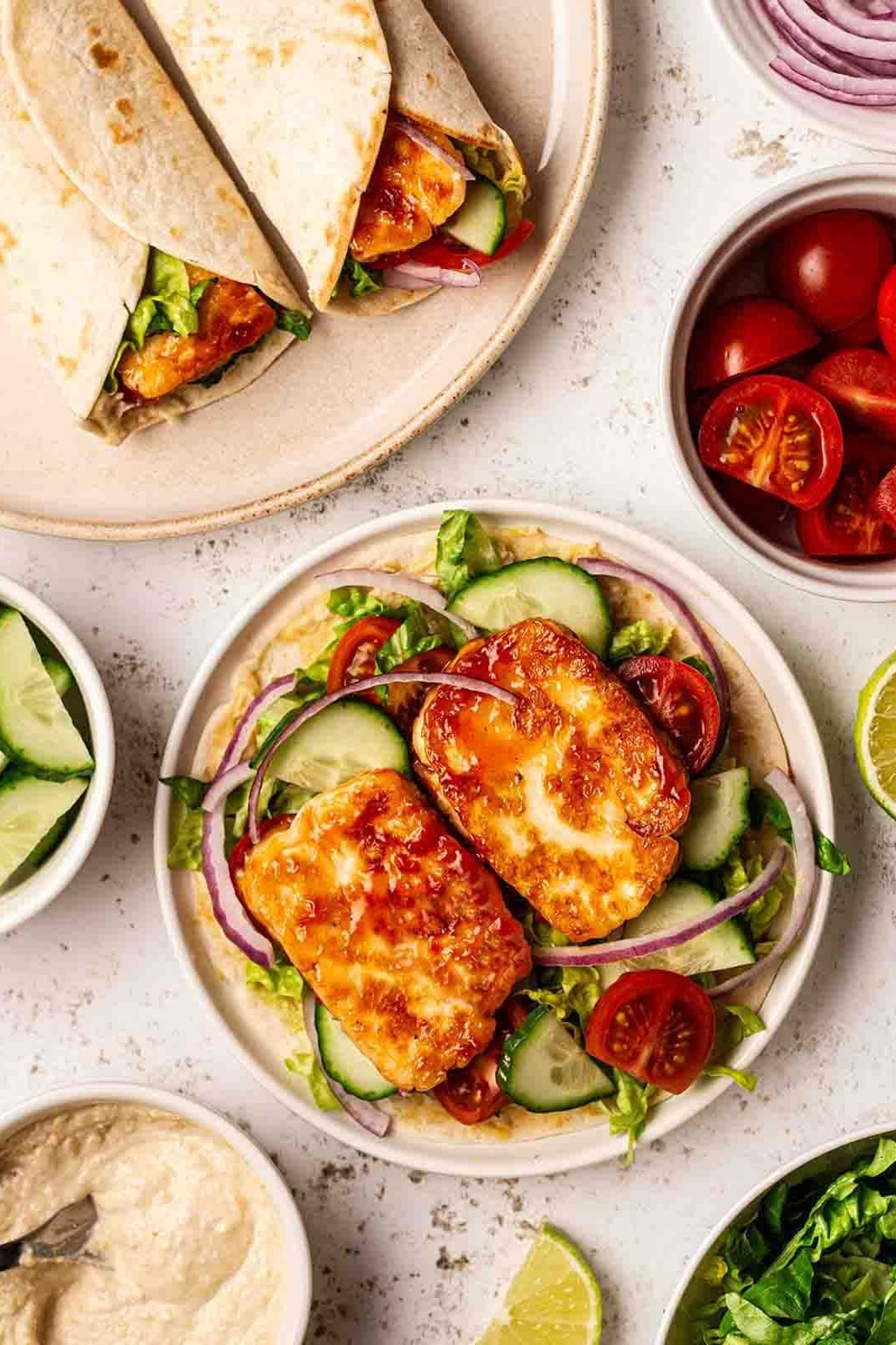 Halloumi wraps on a plate.