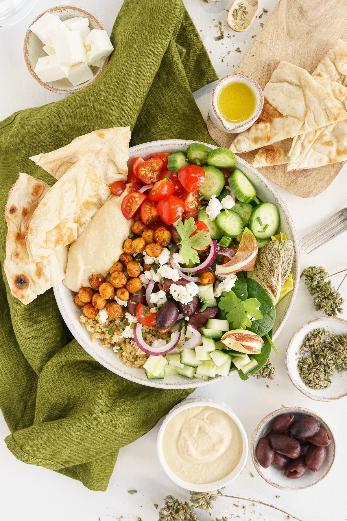 Hummus bowl with pita bread.