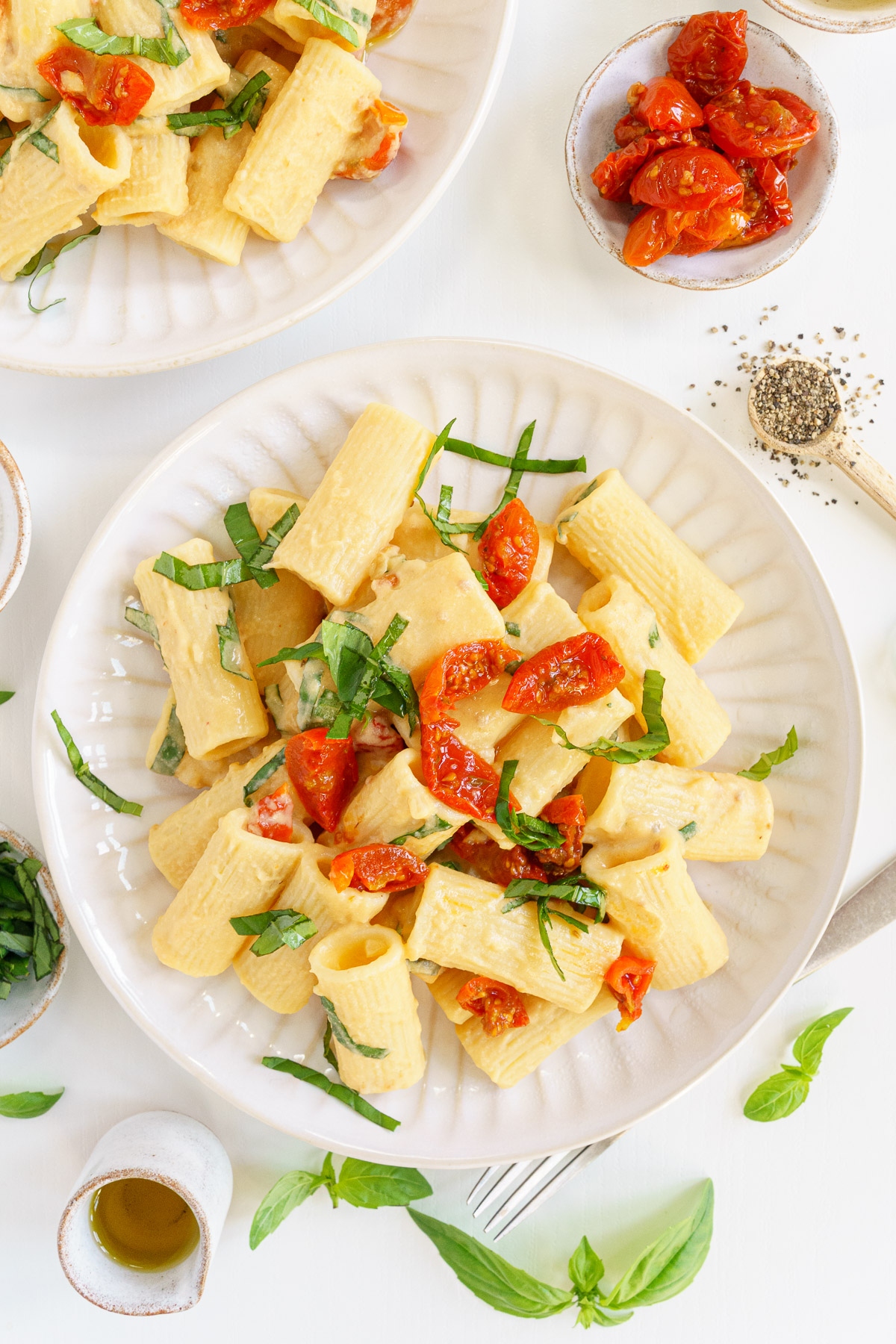 A plate of hummus pasta.