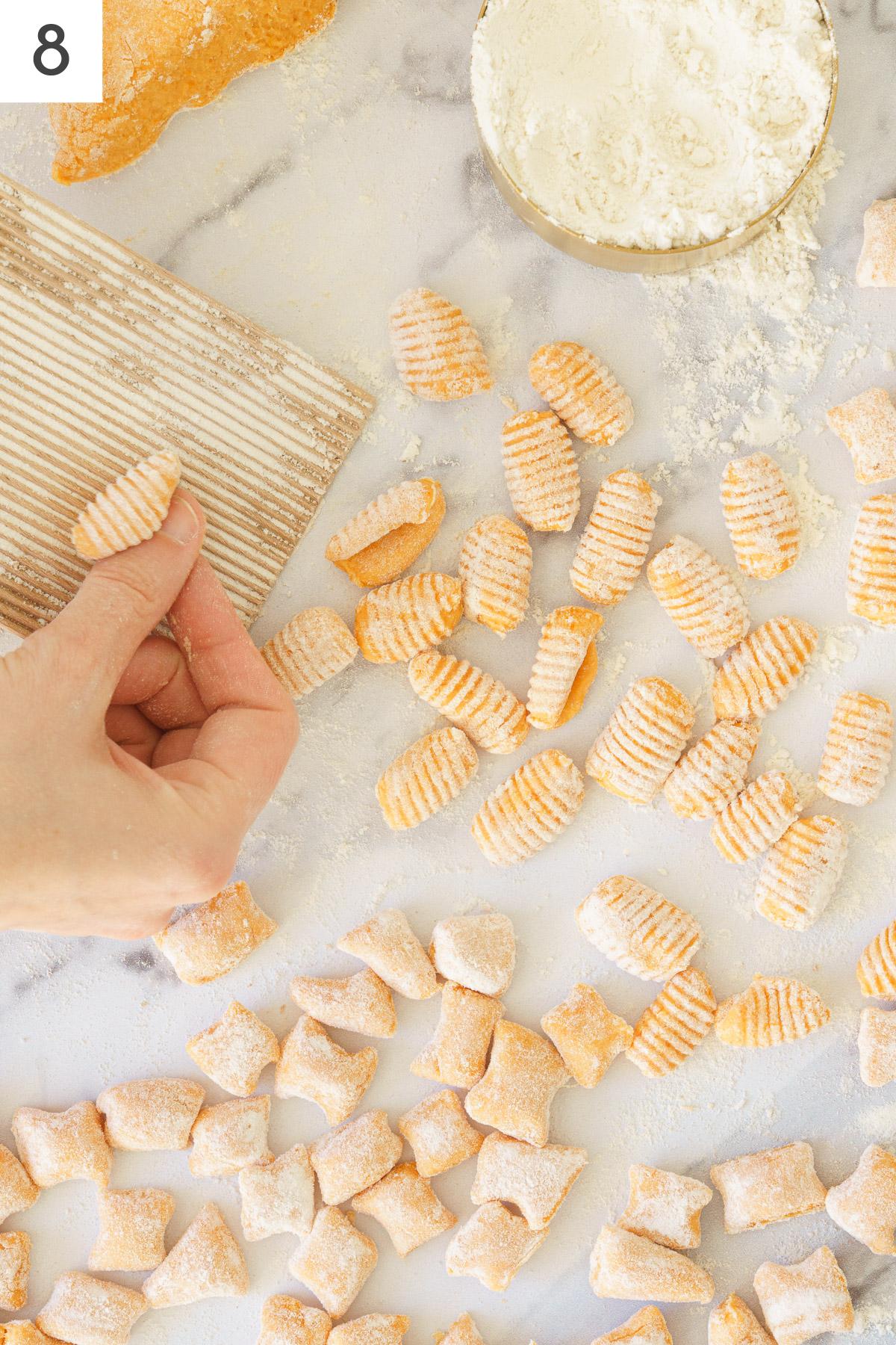 Making ridges using a gnocchi stripper.