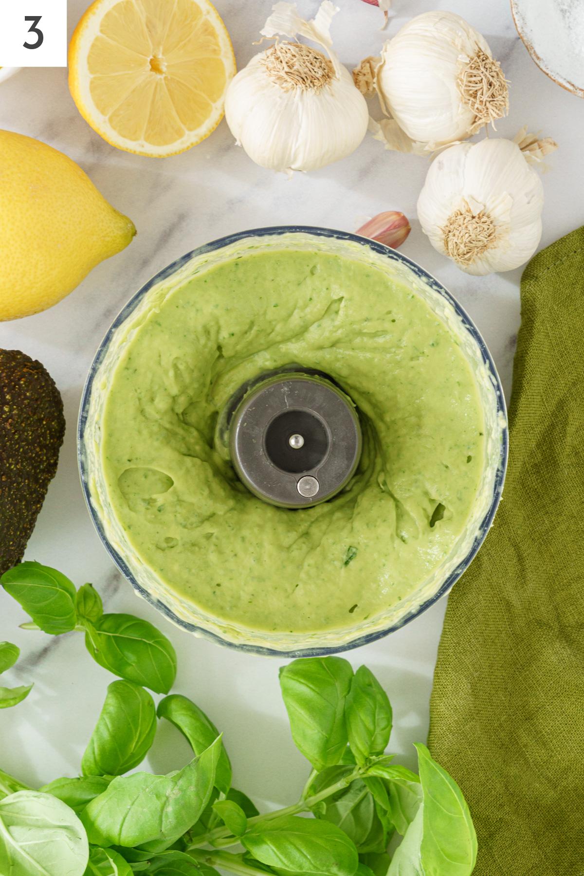Blended avocado in a food processor.