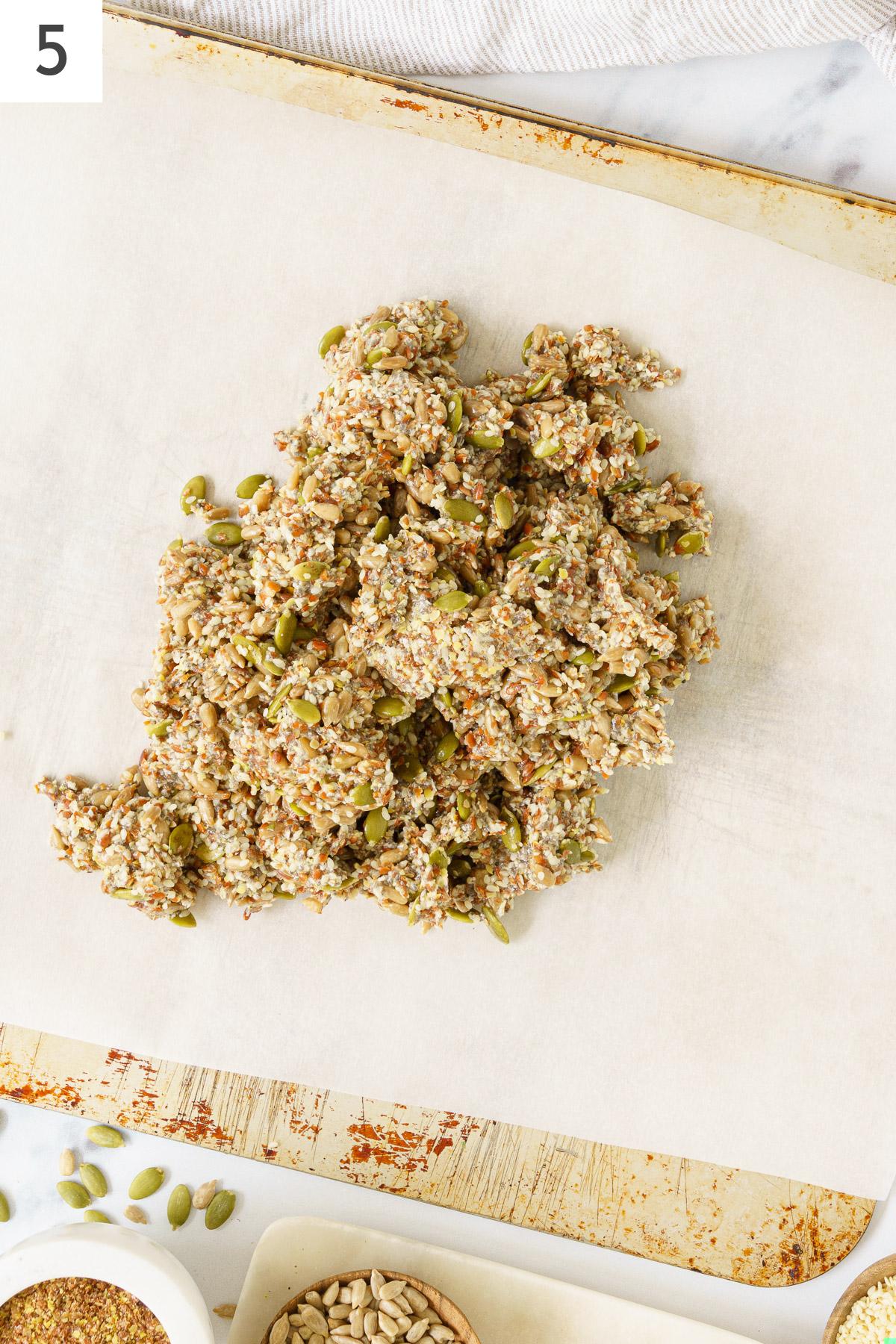 A dough like mixture of the combined ingrediets on a baking sheet.